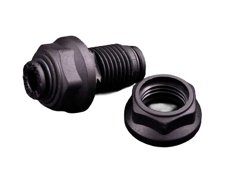 Raccord pneumatique passe-cloison de type push-in